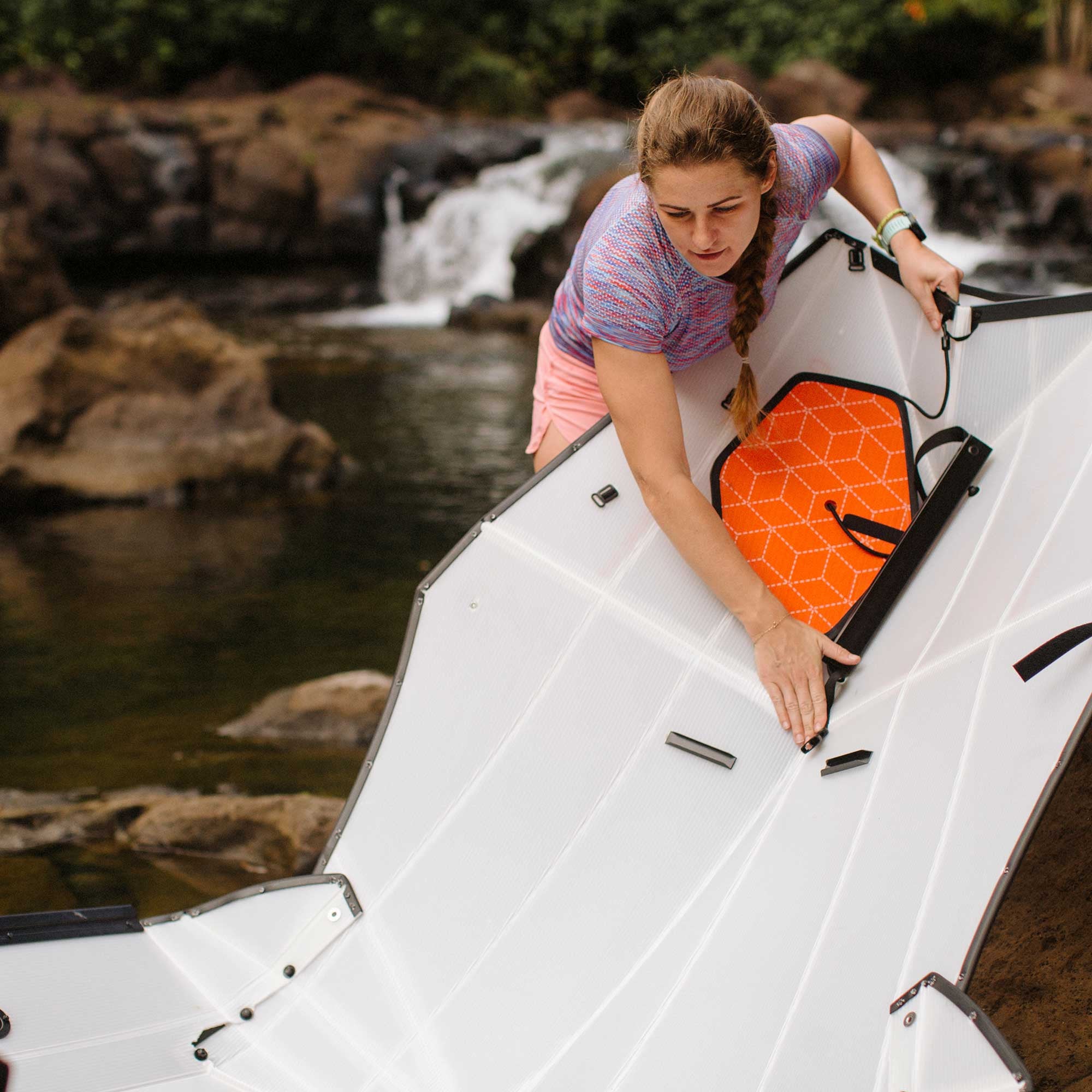 woman assembling beach lt kayak 