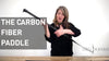 A woman describing the features of the paddle