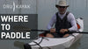A man in a kayak on the lake