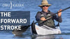 A man kayaks in the water.