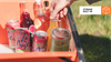 Close up of Oru Camp Switch table storage compartments to store beverages